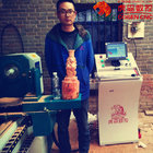 CNC wood lathe center for turning ,engraving ,smoothening  withautomatic feeding system CE to make wood working