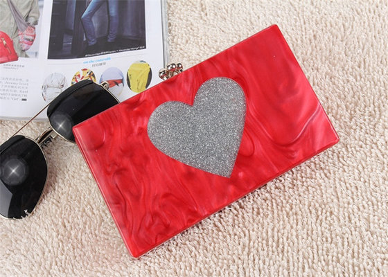 China Wedding Hard Case Acrylic Clutch Bags , Ladies Red Clutch Bag With Silver Heart Glitter supplier