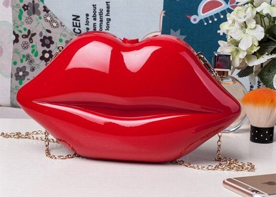 China Trendy Stylish Adorable Makeup Acrylic Clutch Bag Lip Shaped As Cosmetic Bag supplier