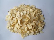 white dried garlic flakes without root
