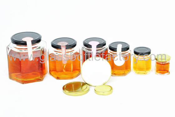 China Clear Glass Hexagonal Jars With Lids supplier
