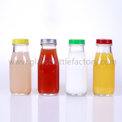 China 300ml Starbucks Style Glass Milk/Juice Bottles With Caps supplier