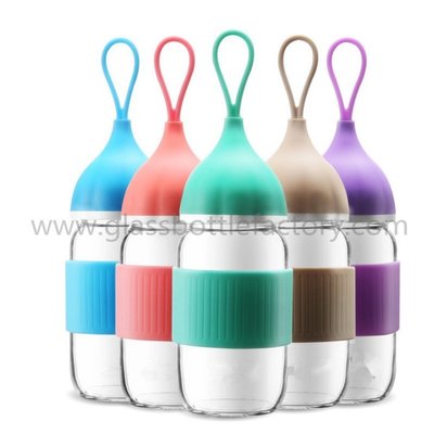 China 300ml Clear Water Glass Bottle With Blue Cap For Gift supplier