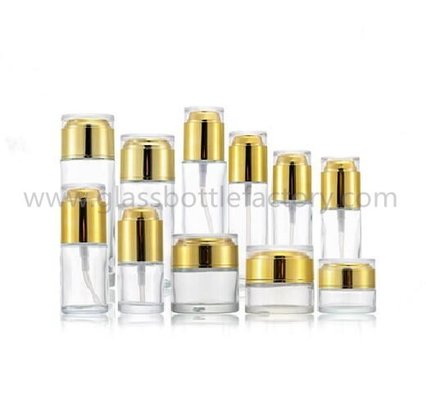 China 20ml,30ml,40ml,50ml,60ml,80ml,100ml,120ml Clear Frost Cylinder Glass Lotion Bottles &amp; Glass Cosmetic Jars With Gold Caps supplier