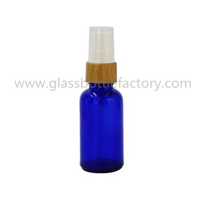 China 5ml-100ml Blue Essential Oil Glass Bottle With Bamboo Pump supplier