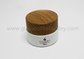 30g,50g High Quality Frost Round Glass Cosmetic Jars With Wood Lids supplier