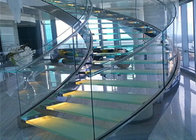 tempered dark grey glass tread curved staircase with tempered clear glass railing top railing