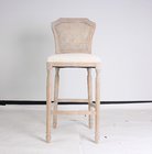 China Wholesale event odd country style bar stool chair rattan back antique bar stools wooden carved with linen fabric barstoo manufacturer