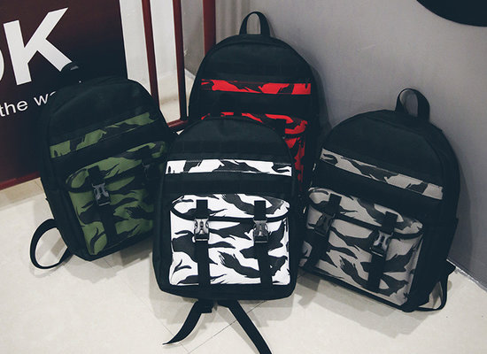 China New camo printed backpack fashion contrast color student bag large outdoor leisure travel backpack supplier