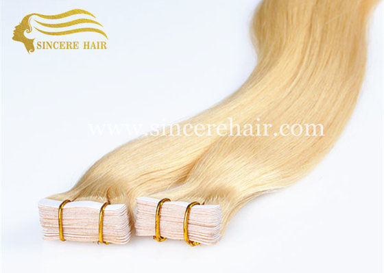 China 24 Inch Blonde Colour Double Drawn Glue Tape In Remy Human Hair Weft Extensions for sale supplier