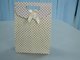 Customized recyclable cardboard paper wedding bags with die cut handle gift pouch supplier