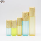 Custom Color Frosted Plastic Cosmetic Lotion Pump Bottle with Bamboo Cap