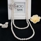 Women White Shell Pearl Double Strands Sweater Necklace with Cubic Zirconia Bow Charm (SN702143BOW)